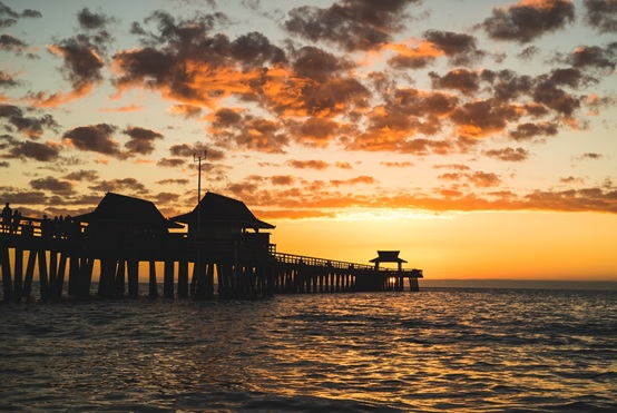 view from an aerial tour of Naples Pier at sunset